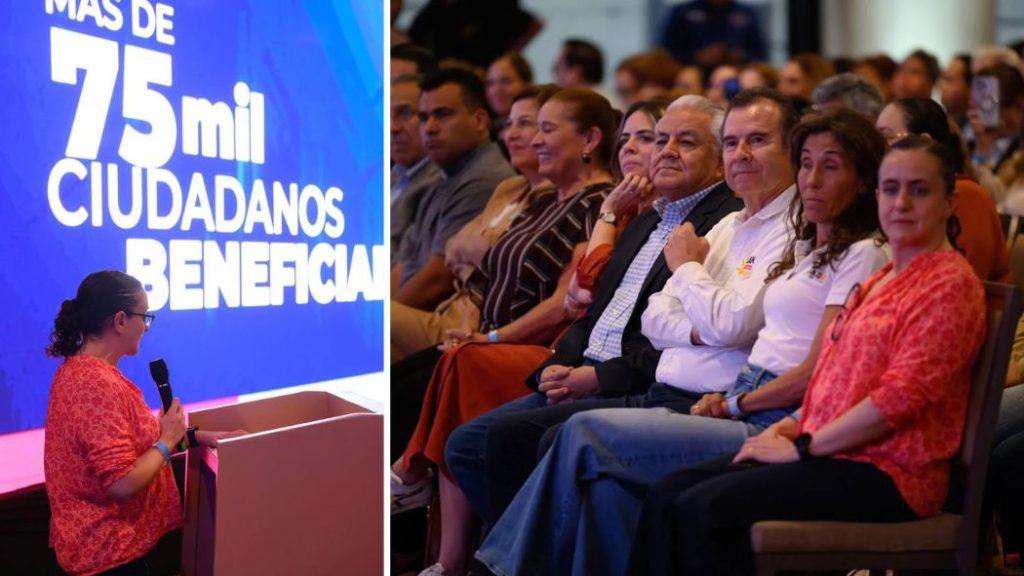 Las-obras-para-iniciar-las-construcciones - Informe Regio Speaker at a podium addressing an event with a blue banner behind reading 75 mil ciudadanos Audience seated and listening in the background Informe Regio