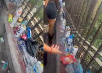 Littered sidewalk along a railing with plastic bottles cans and wrappers scattered on the ground   Informe Regio