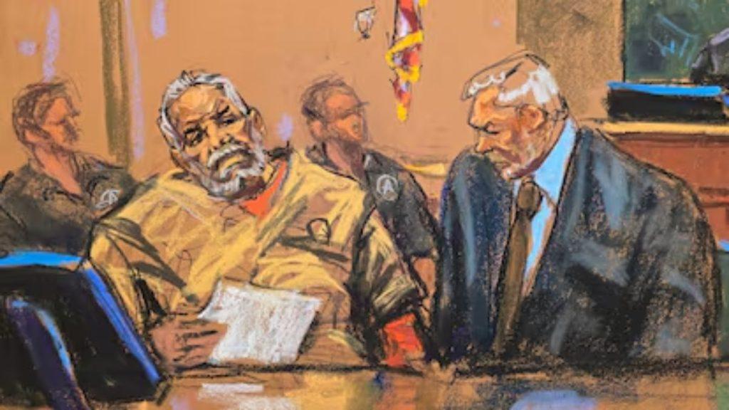 Mayo-zambada-cadena-perpetua - Informe Regio Courtroom sketch of a man in an orange jumpsuit seated with a lawyer in a dark suit at a bench papers in hand Informe Regio