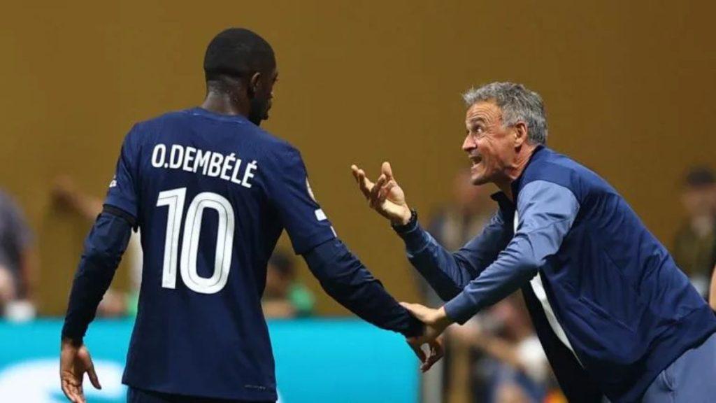 Psg-aston-villa-europa-2026 - Informe Regio Soccer player O Dembélé wearing number 10 jersey shaking hands with a coach in a blue tracksuit on the field Informe Regio