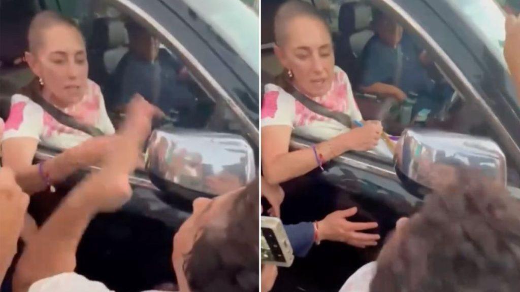 Woman sitting in a car window down addressing a crowd that gathers at the vehicle and reaches toward her   Informe Regio
