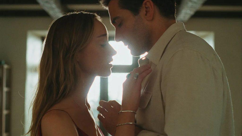 Couple standing close nearly kissing with foreheads near each other in a sunlit room   Informe Regio